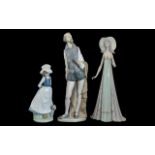 Lladro Figurine & Two Nao Figures, all with slight damage, Lladro tall lady 13.5'' finger missing,