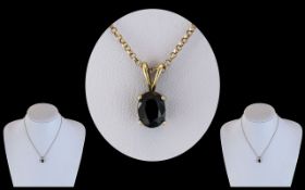 Ladies Attractive 9ct Gold Blue Sapphire Set Drop Pendant, With Attached 9ct Gold Chain.