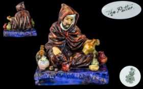 Royal Doulton Hand Painted Porcelain Figure ' The Potter ' HN1493. Designer C.J.Noke.