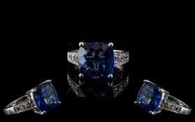 Colour Change Fluorite Ring, a 6ct square cushion cut, sapphire blue, fluorite, which changes colour