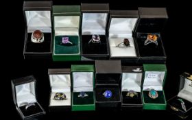 Collection of Twelve Silver Dress Rings, comprising stone set, various styles and designs.
