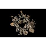 Heavy Vintage Silver Charm Bracelet.