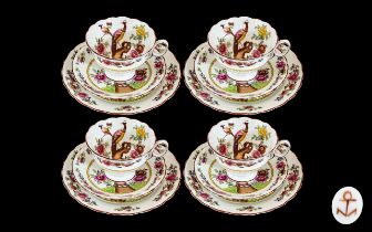 Chelsea Porcelain 'Birds' Trios, comprising four cups, saucers and side plates,