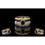 18ct Gold Bespoke Diamond and Sapphire Set Designer Ring, the cabochon cut sapphire of excellent