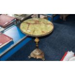 Circular Faux Marble Topped Side Table, raised on a brass pedestal,