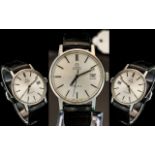 Gents Omega Automatic Wristwatch Silvered Dial, Baton Numerals, Center Seconds And date Aperture,
