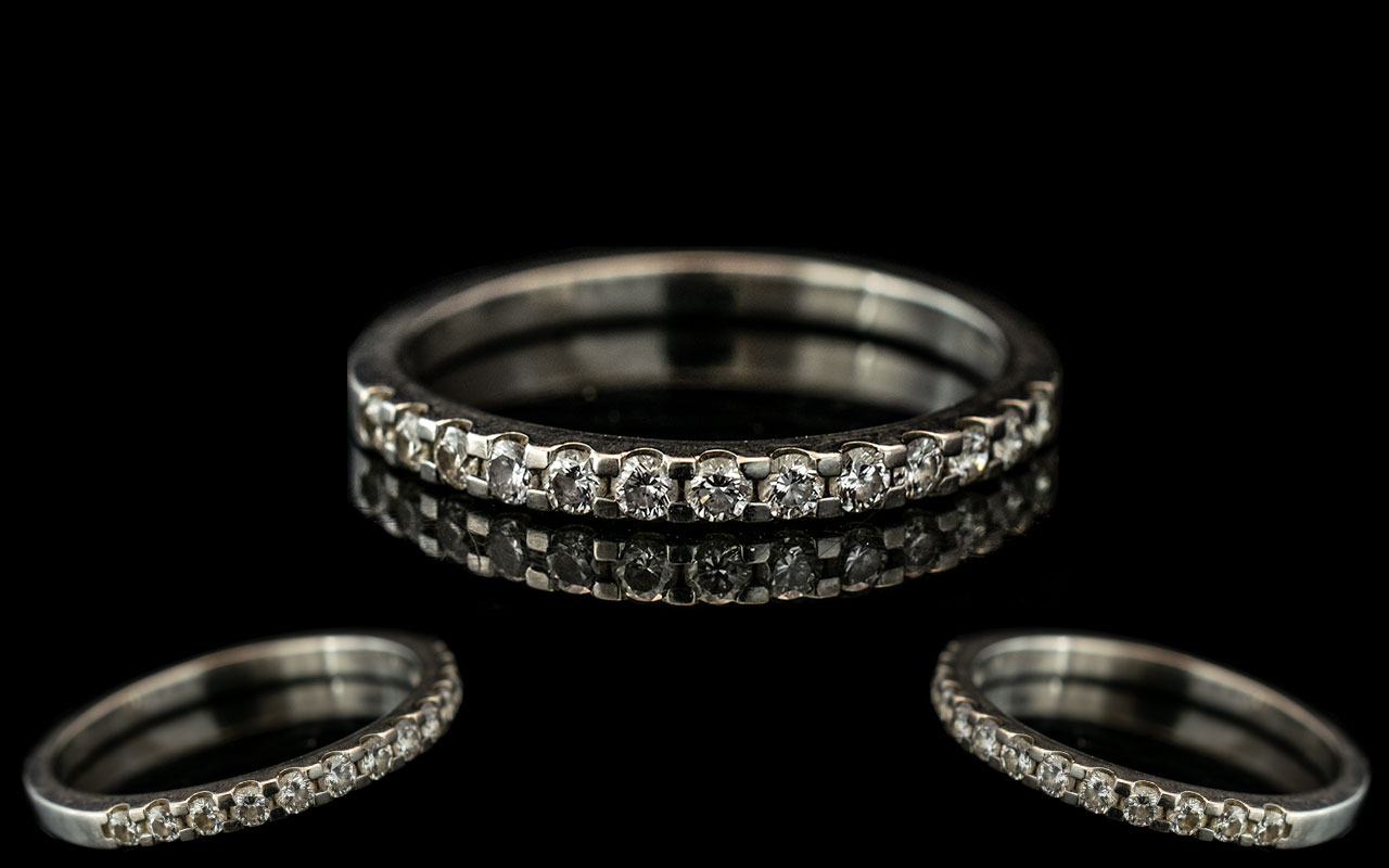Channel Set Diamond Half Eternity Ring, set in platinum, weight 3.15.