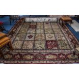 Large Wool Rug, Beige ground with red designs depicting animals, fruit trees, and flowers.