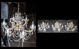 Three Matching Decorative Crystal Chandeliers, each set with six candle lights,