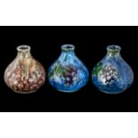 Three Small Cobridge Vases, a pair decorated with oak leaves and berries, and one mottled design.
