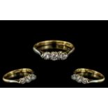 18ct Gold and Platinum Attractive 3 Stone Diamond Set Ring of Small Proportions. Marked 18ct and