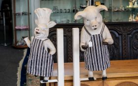 Novelty Ex Shop Displays - ( 2 ) Butchers Pigs of Humours Form, Both on a Large Wooden Stand,
