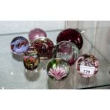 Collection of Quality Paper Weights, eight in total, in shades of pink and rose,