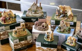 Collection of 14 Lilliput Lane Cottages, comprising Wisteria Lane, The Joys of Spring, Vine Cottage,