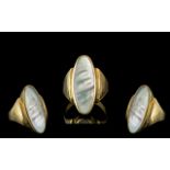 A Large and Impressive 9ct Gold Mother of Pearl Set Statement Ring of Pleasing Proportions.