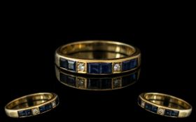 14ct Gold Diamond & Sapphire Eternity Ring, stamped 585, ring size M.