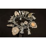 Ladies Silver Charm Bracelet, Clasp Is Hallmarked and Some Charms Also. Charms Includes Bell,