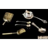A Small Collection of Antique Sterling Silver Assorted Spoons and Tea Strainers.