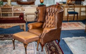 Leather Wing Back Chesterfield Chair & Matching Footstool, buttoned back style with stud trim,