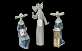 Three Lladro Figures of Nuns, comprising No. 5502 'Meditation' depicting a kneeling Nun at prayer,