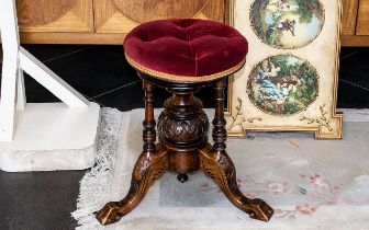 A Victorian Style Piano Stool with velvet buttoned seats.