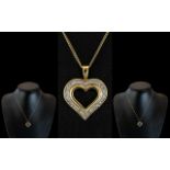 9ct Gold Heart Shaped Diamond Set Pendant with Attached 9ct Gold Chain.