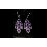 Amethyst 'Leaf' Drop Earrings, each drop set with five similarly sized oval amethysts,