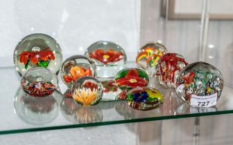 Collection of Quality Paper Weights, ten in total, in shades of amber and orange,