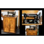 Vintage Gritzner Vintage German sewing machine housed in a wooden cabinet. Key's, Foot pedal,