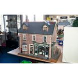 Beautiful Doll's House with 'Antiques & Curios' Shop to front, full of exquisite scale furniture,