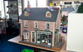 Beautiful Doll's House with 'Antiques & Curios' Shop to front, full of exquisite scale furniture,