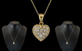 18ct Gold Attractive Diamond Set Heart Shaped Pendant with Attached 9ct Gold Chain.