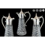 A Stunning Quality and Heavy Sterling Silver and Cut Glass Claret Jug of Pleasing Proportions.