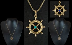 18ct Gold Novelty Realistic Ships Wheel Pendant Set with Turquoise and Sapphire to Centre.