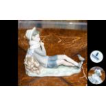 Lladro Figure of a Young Boy with a Bird on His Foot,