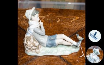Lladro Figure of a Young Boy with a Bird on His Foot,