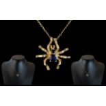 9ct Gold Novelty Sapphire Set Spider Pendant with Attached 9ct Gold Chain. Both Marked for 9ct.