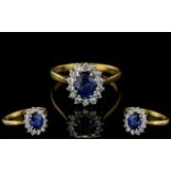Ladies - 18ct Gold Attractive Sapphire and Diamond Set Dress Ring.