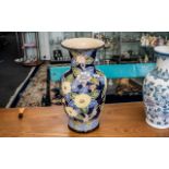 Large Decorative Vase in shades of blue and yellow, marks to base, measures 20" tall.