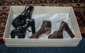 2 Pairs of Vintage Clubbing Shoes. 1 Pair Is Black and the Other Is a Rust Colour. Heights of the
