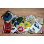 Box of Girl Guide Memorabilia, including metal badges, fabric badges, coins, pin badges, cuff links,