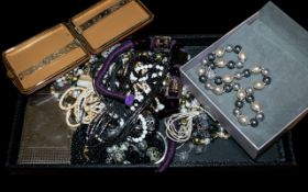 Collection of Costume Jewellery, comprising necklaces, beads, pearls, pendants, cigarette case,