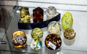 Collection of Quality Paper Weights, ten in total, in shades of amber and yellow,