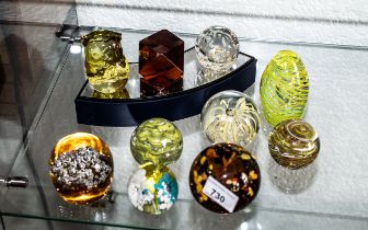 Collection of Quality Paper Weights, ten in total, in shades of amber and yellow,
