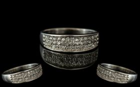 9ct White Gold Diamond Ring, set with three rows of pave set round cut diamonds, fully hallmarked.
