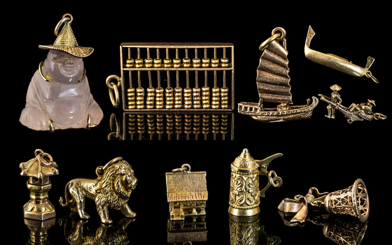 A Good Collection of Antique and Vintage 9ct Gold Charms,