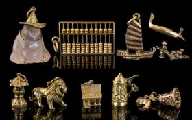 A Good Collection of Antique and Vintage 9ct Gold Charms,