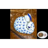 Royal Crown Derby Rabbit Paperweight, blue and gilt design, with gold stopper.