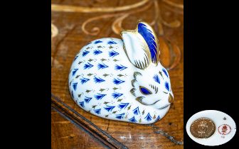 Royal Crown Derby Rabbit Paperweight, blue and gilt design, with gold stopper.