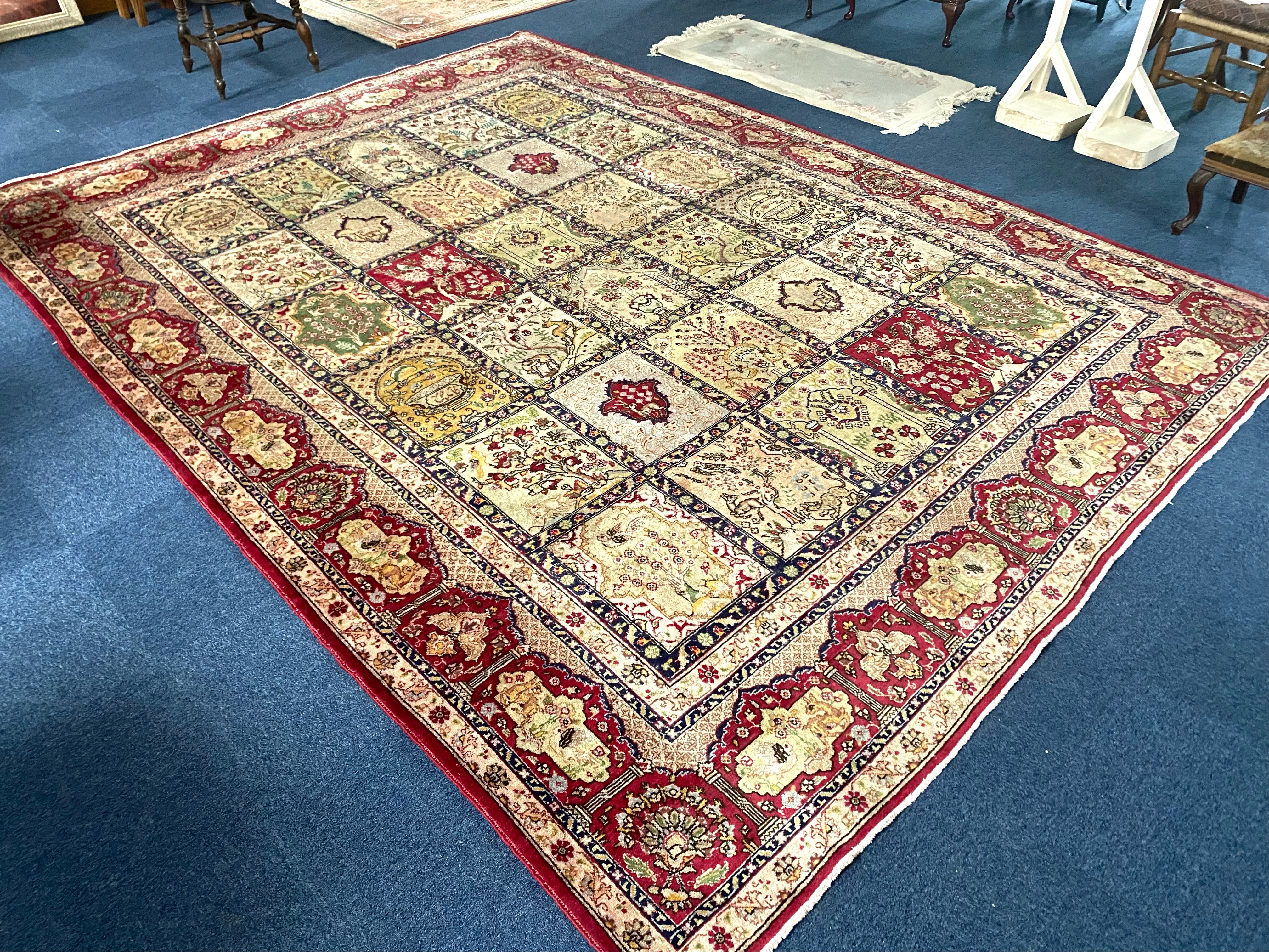 Large Wool Rug, Beige ground with red designs depicting animals, fruit trees, and flowers. - Bild 3 aus 3